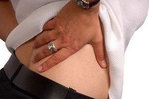 Почему болит правая часть спины внизу