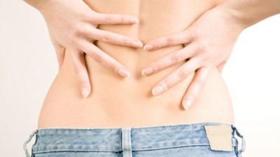 Из за чего болит низ спины у женщин